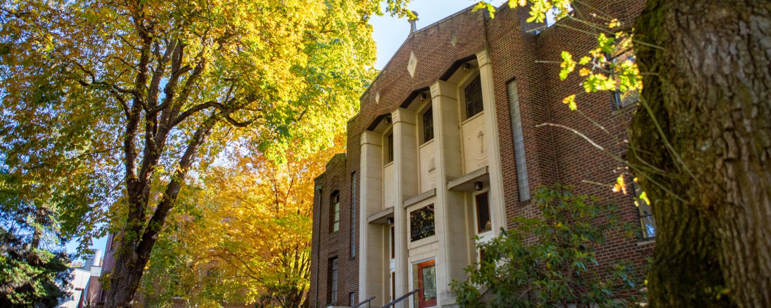 An autumn picture of McKinley Hall on the SPU campus.